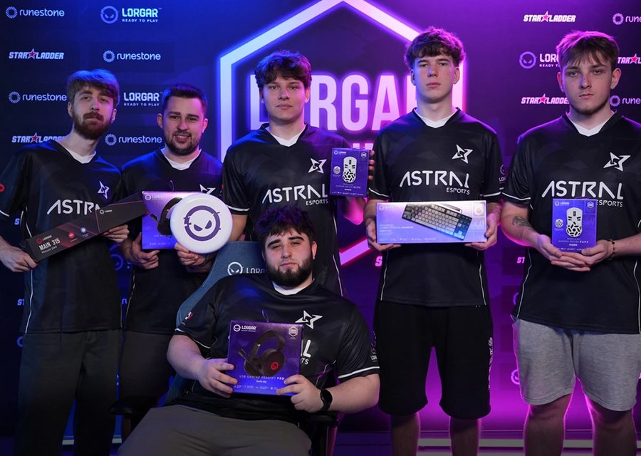 Astral Esports players with boxes of LORGAR gear on the LORGAR RANKINGS tournament stage