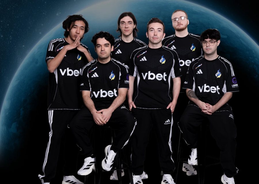 The Passion UA roster in adidas shirts with the LORGAR logo against a globe backdrop